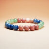 Celestia Arbor crystal bracelet with Blue Aventurine, Red Wood Grain, and Green Aventurine for health, charm, and good fortune.