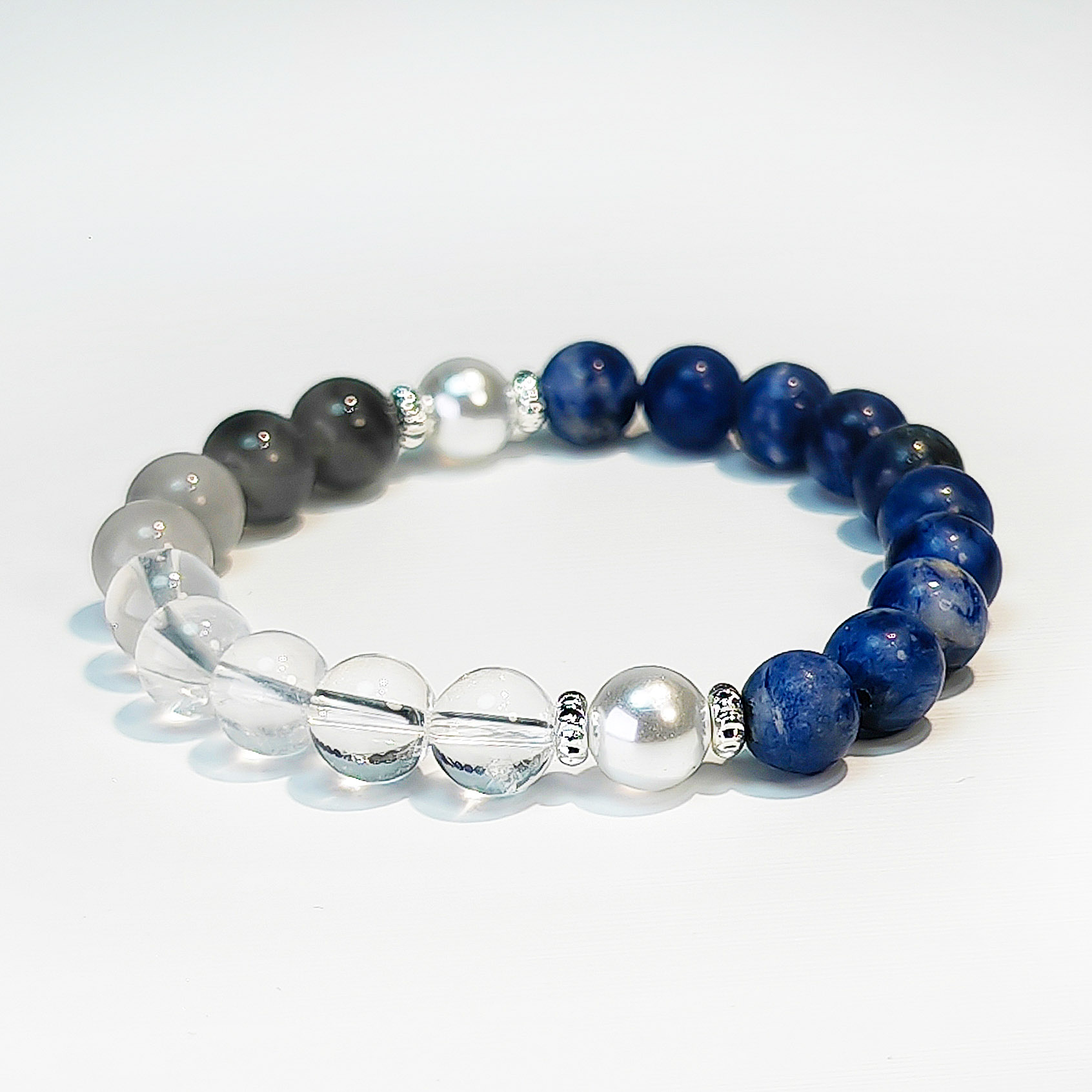 Water and Metal energy bracelet with Sodalite, White Phantom Quartz, Clear Quartz, and Pearl