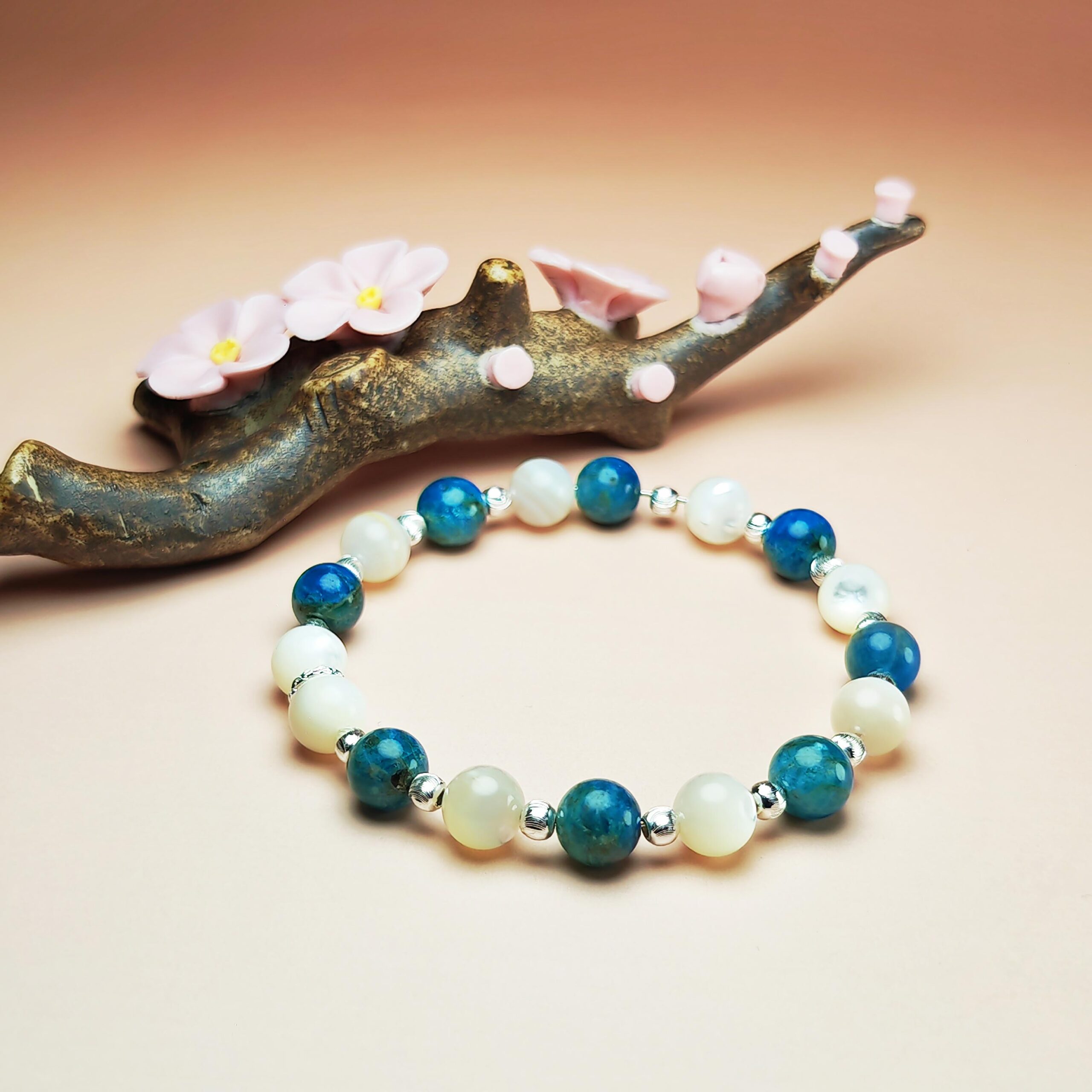 Lunaris Flux crystal bracelet with Shell Pearl and Blue Apatite for good luck and wisdom.