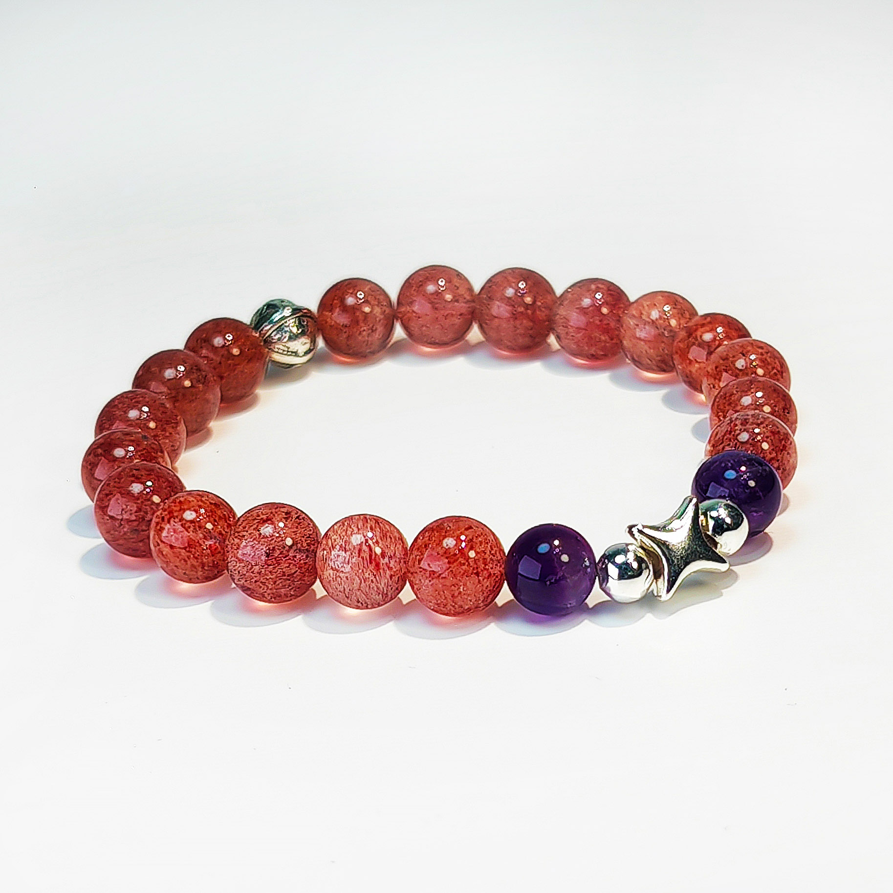 Handcrafted bracelet made with Strawberry Quartz and Amethyst representing the dreamy essence of the Fire Force.