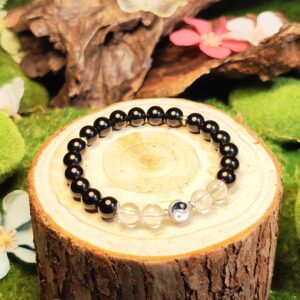 Obsidian and Clear Quartz bracelet designed for focus, protection, and career energy boost