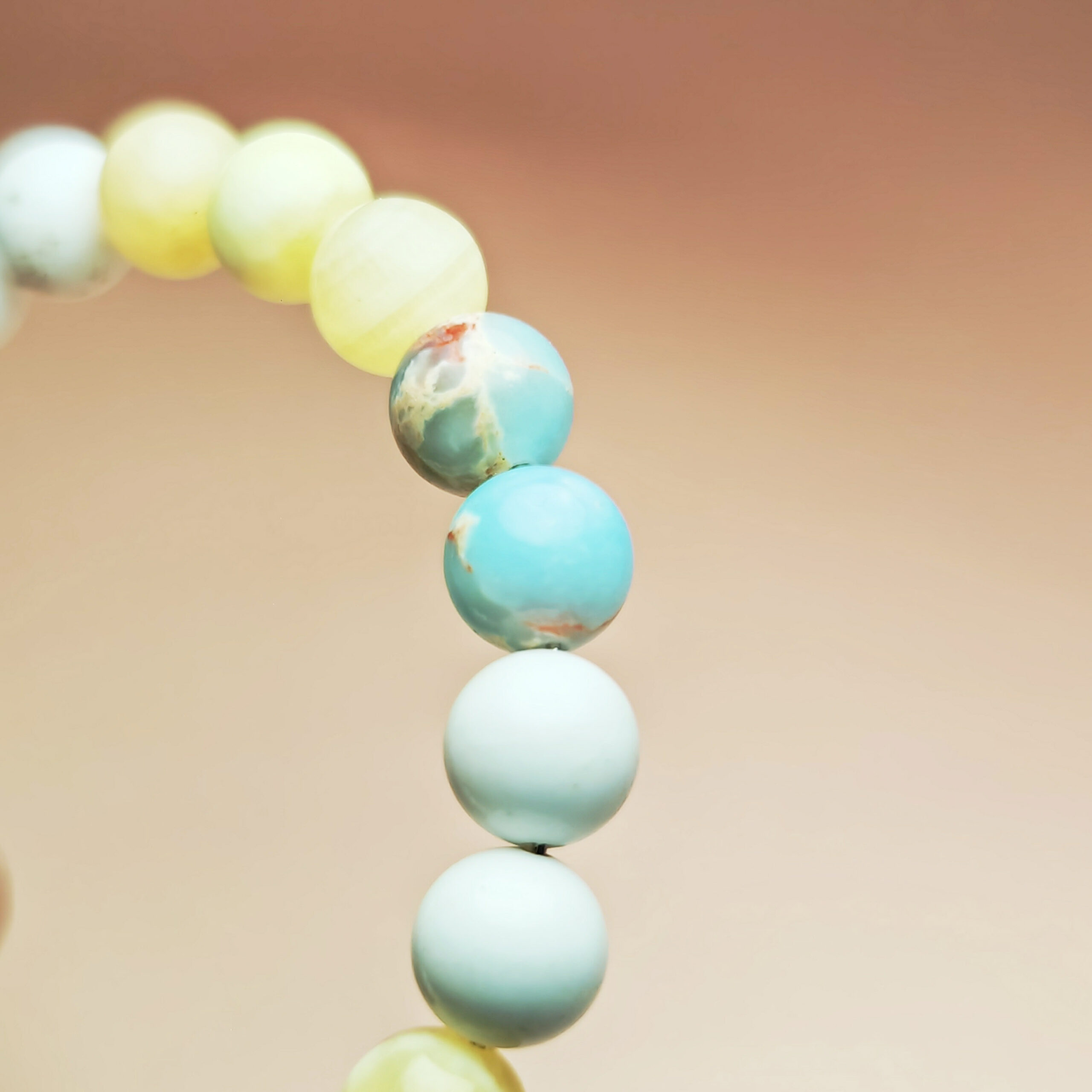 Aurum Meridian crystal bracelet with Shoushan Stone, Yellow Calcite, and White Magnesite for career stability and financial growth.