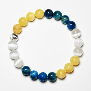 Fortuna Arc crystal bracelet with yellow calcite, blue apatite, and white selenite for wealth and prosperity.