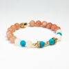 Solar Flow bracelet with Sunstone, Shell, and Turquoise for confidence and calm communication