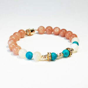 Solar Flow bracelet with Sunstone, Shell, and Turquoise for confidence and calm communication
