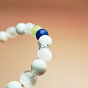 Fortuna Arcana crystal bracelet with White Magnesite, White Selenite, Blue Aventurine, and Grape Chalcedony for luck and prosperity.