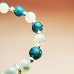 Lunaris Flux crystal bracelet with Shell Pearl and Blue Apatite for good luck and wisdom.