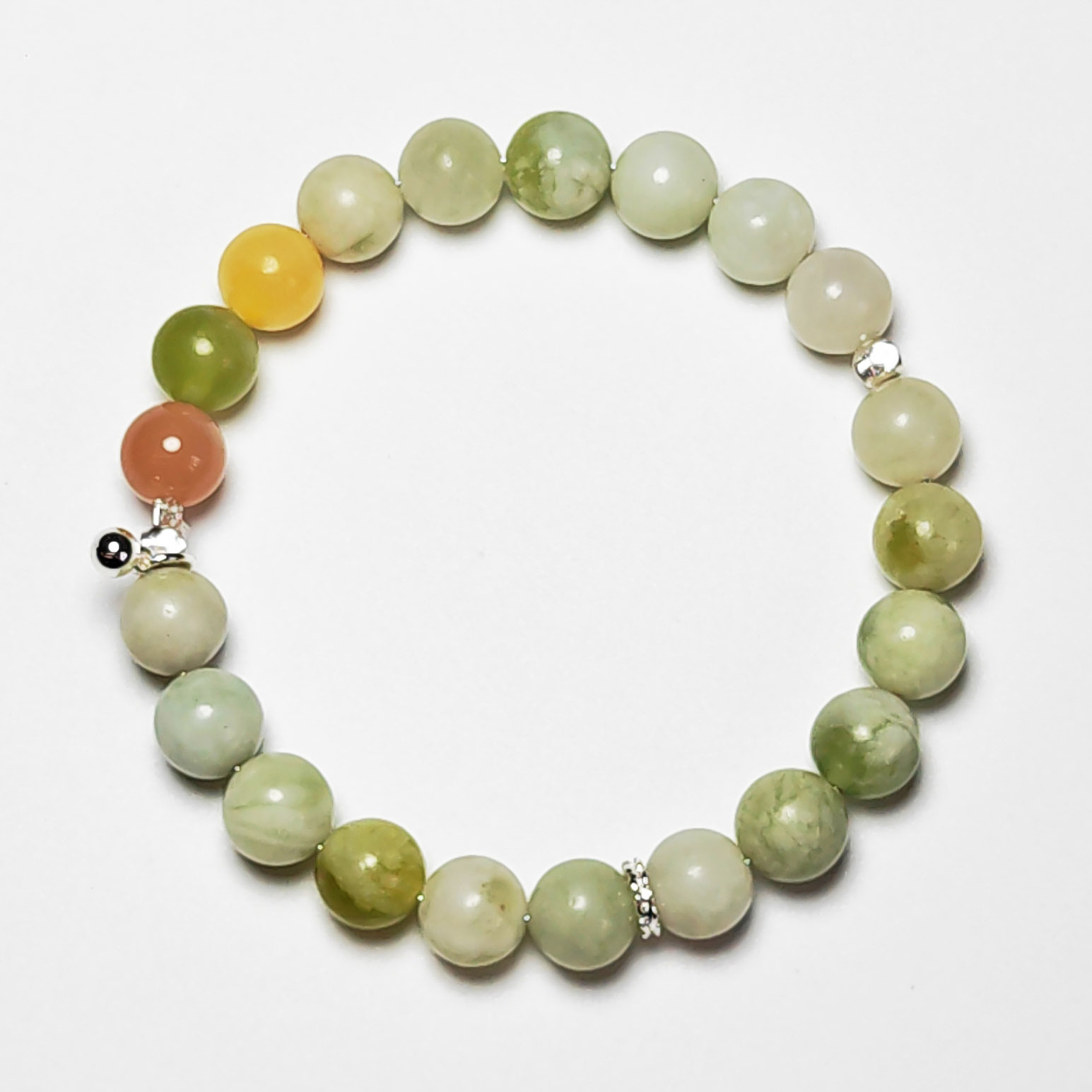 Aurora Threshold crystal bracelet with Green Grape Calcite, Orange Moonstone, and Yellow Calcite for new beginnings and lasting success.