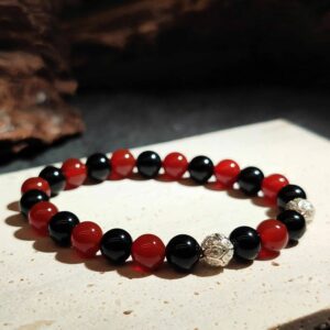 Union Core bracelet with Obsidian, Red Agate, and silver beads for balancing relationships and emotions