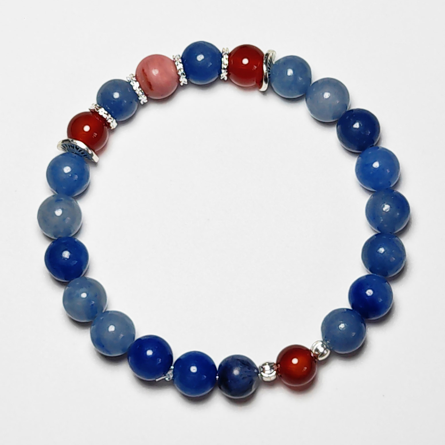 Fortuna Ember crystal bracelet with Red Agate, Red Wood Grain Jasper, and Blue Aventurine for love, fortune, and opportunity.