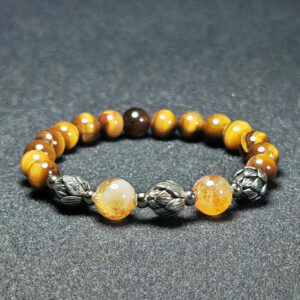 Golden Pulse bracelet with Yellow Tiger’s Eye, Yellow Fluorite, and metal accents for prosperity and grounded success