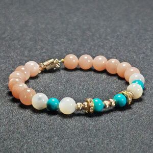Solar Flow bracelet with Sunstone, Shell, and Turquoise for confidence and calm communication