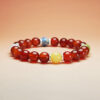 Solar Crest five element crystal bracelet with white jade, dumortierite, grape chalcedony, red agate, and yellow calcite for luck and career growth.