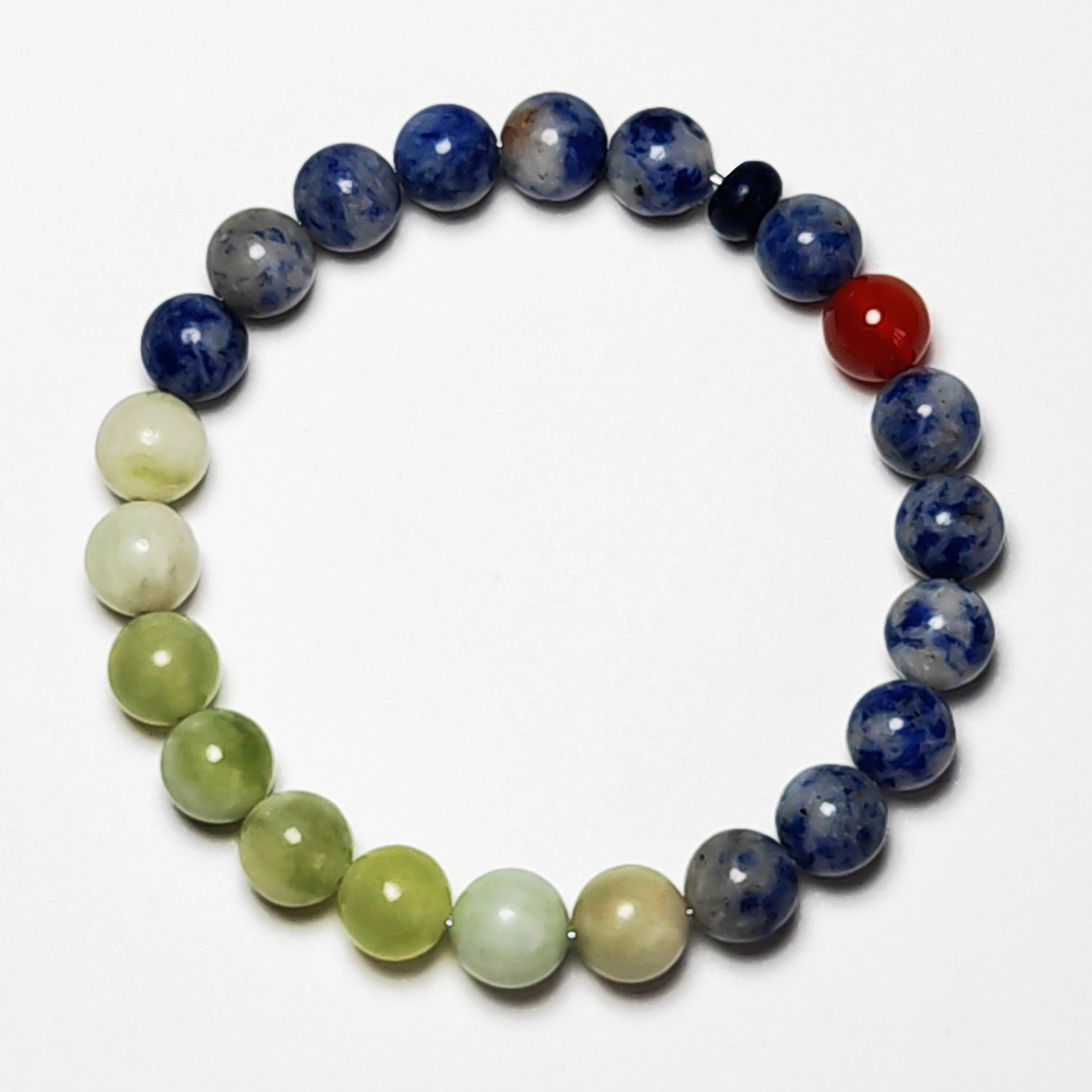 Fortune Rise zodiac crystal bracelet with blue aventurine, grape chalcedony, dumortierite, and red agate for Pisces, Cancer, Leo, and Sagittarius.