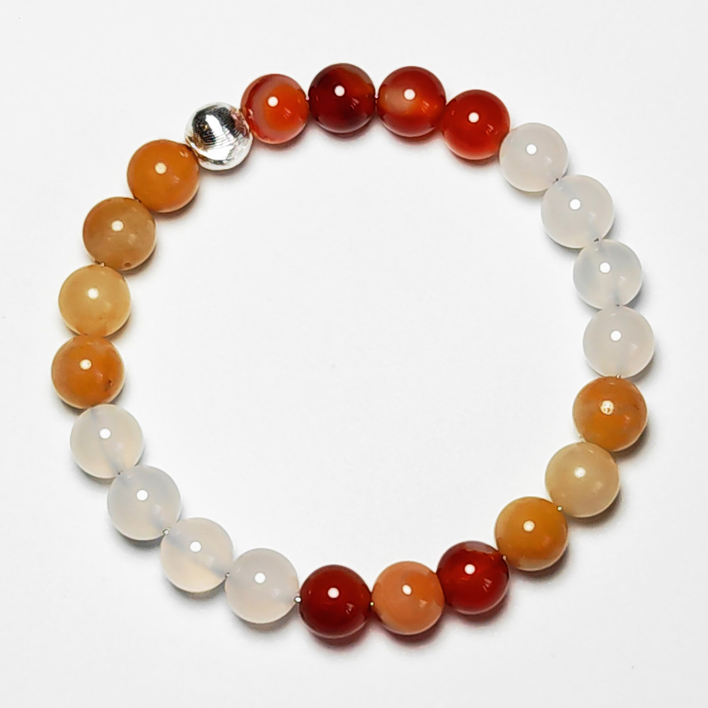 Ember Vault crystal bracelet with red agate, yellow jade, and white agate for wealth, stability, and protection.