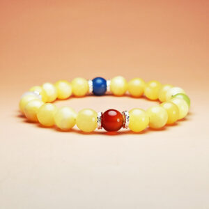 Celestial Ascent zodiac crystal bracelet with grape chalcedony, blue aventurine, blue-spot dumortierite, and red agate for Pisces, Cancer, Leo, and Sagittarius.