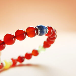 Solar Crest five element crystal bracelet with white jade, dumortierite, grape chalcedony, red agate, and yellow calcite for luck and career growth.