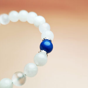 Auric Current zodiac crystal bracelet with white selenite, white agate, and blue aventurine for Virgo, Libra, Scorpio, and Pisces.