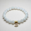 Luna Aegis white jade zodiac bracelet with Cancer pendant for intuition and serenity.
