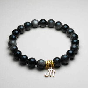 Noctis Veil silver obsidian zodiac bracelet with Scorpio pendant for protection and transformation.