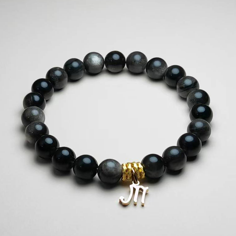 Noctis Veil silver obsidian zodiac bracelet with Scorpio pendant for protection and transformation.