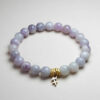 Sagitta Nova lepidolite zodiac bracelet with Sagittarius pendant for transformation and exploration.