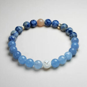 Taurus Solara zodiac bracelet with Dumortierite, Angelite, Blue Chalcedony, and Orange Moonstone for renewal and prosperity.