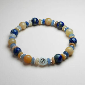 Cancer Lumenis zodiac bracelet with lapis lazuli, yellow topaz, and blue aventurine for balance and prosperity.