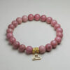 Libra Harmonia rhodochrosite zodiac bracelet with Libra pendant for harmony, love, and prosperity.