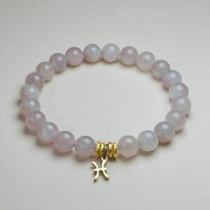 Pisces Serenade rose quartz zodiac bracelet with Pisces pendant for love, intuition, and harmony.